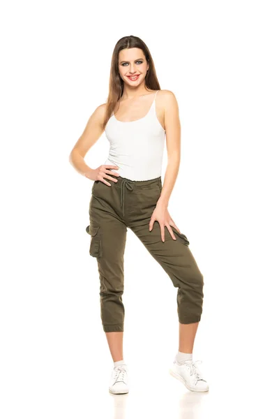 Young Woman Three Quarter Pants Shirt Posing Studio White Background — Stockfoto