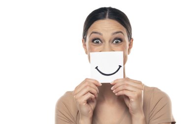 Happy young woman with smile, drawn on sheet of paper on a white studio background.