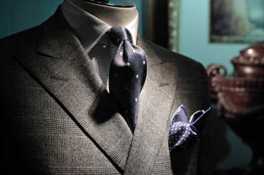 Grey checkered jacket, dark blue tie and handkerchiefGrey check clipart