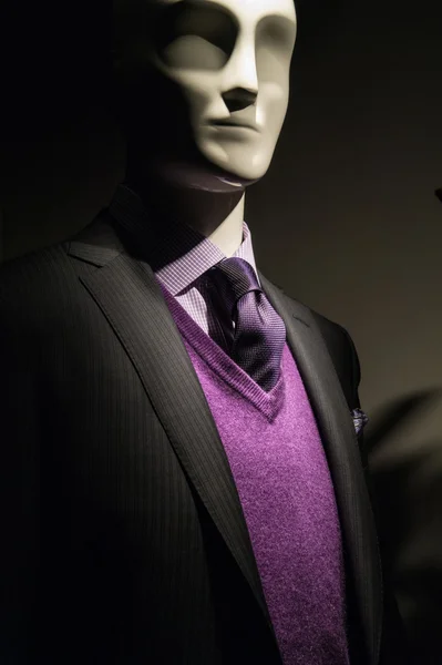 Mannequin in dark jacket with purple sweater and tie — Stock Photo, Image