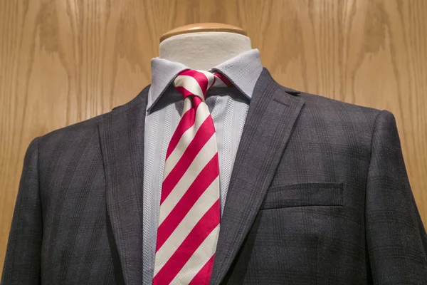 Dark grey jacket with red & white striped tie — Stock Photo, Image