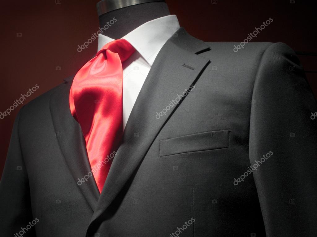 Grey suit red tie white shirt Dark grey jacket with white shirt and