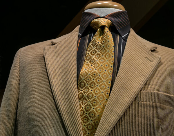 Beige Corduroy Jacket With Black Striped Shirt and Yellow Tie