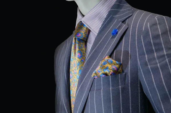 Mannequin in purple striped suit, yellow silk tie & handkerchief — Stock Photo, Image