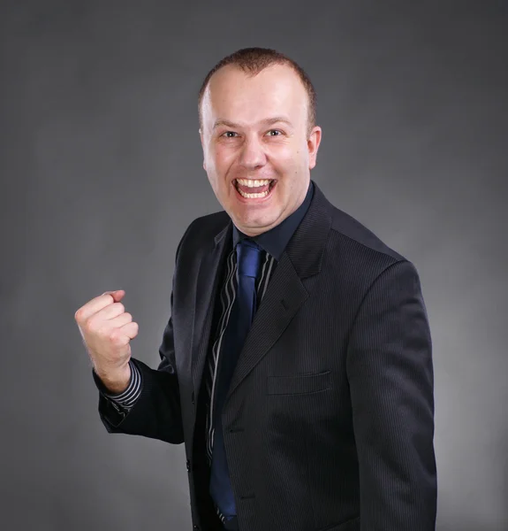 Businessman celebrating victory — Stock Photo, Image