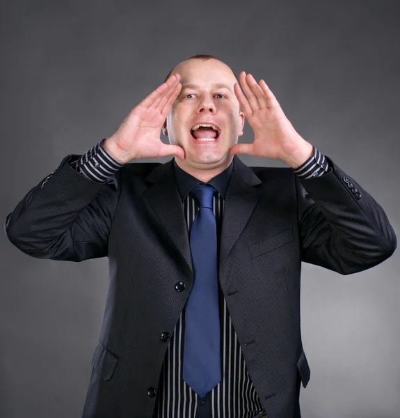 Portrait of a young man screaming out loud — Stock Photo, Image