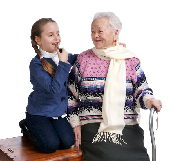 Mormor med sitt barnbarn — Stockfoto