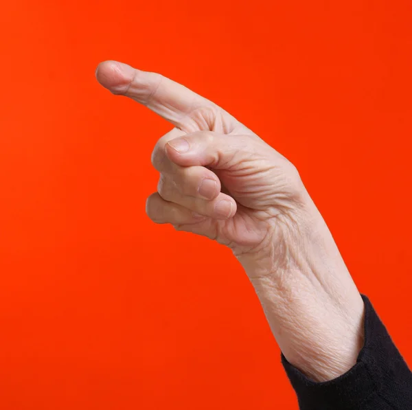 Una vecchia mano femminile — Foto Stock