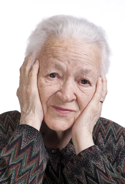 Porträt einer alten Frau, die unter Kopfschmerzen leidet — Stockfoto