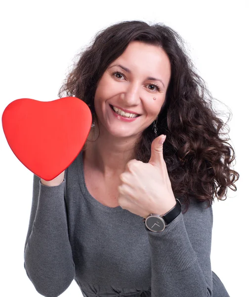Gekrulde vrouw houdt van hart en ja teken weergegeven: — Stockfoto