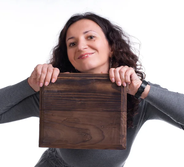 Attractive woman with wooden panel — Stock Photo, Image