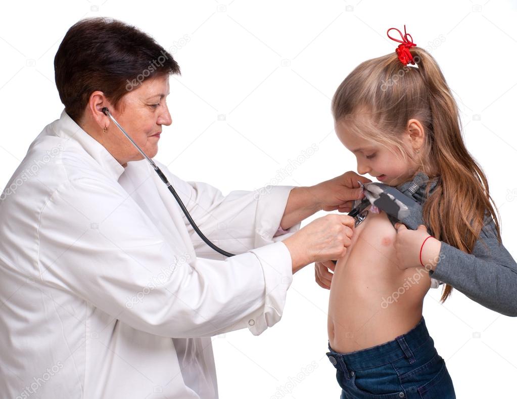 Senior doctor listening girl with stethoscope