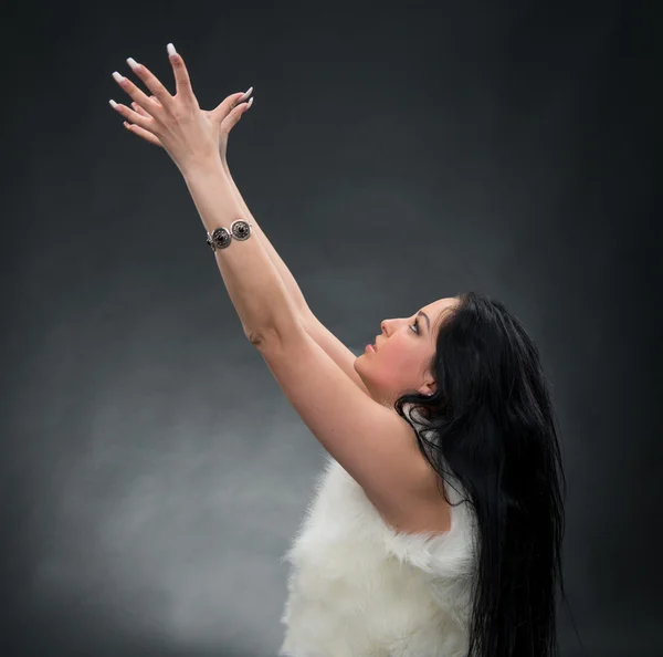 Beautiful young business woman holding her hands up — Stock Photo, Image