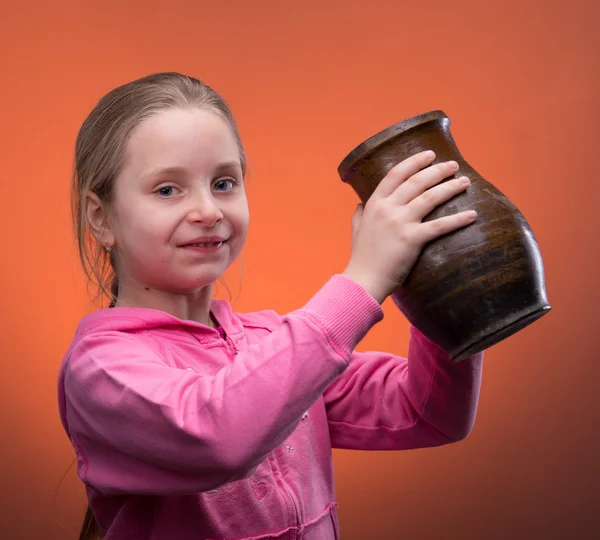 Girl holding a jar — Stock Photo, Image