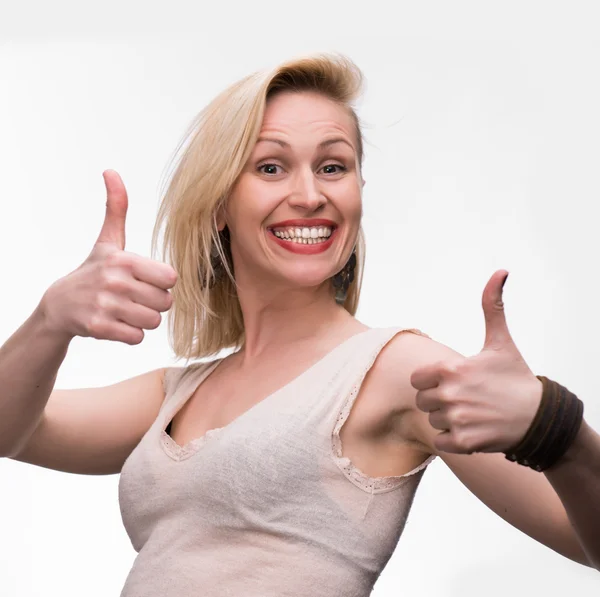 Attraktiv blond visar ja gest — Stockfoto