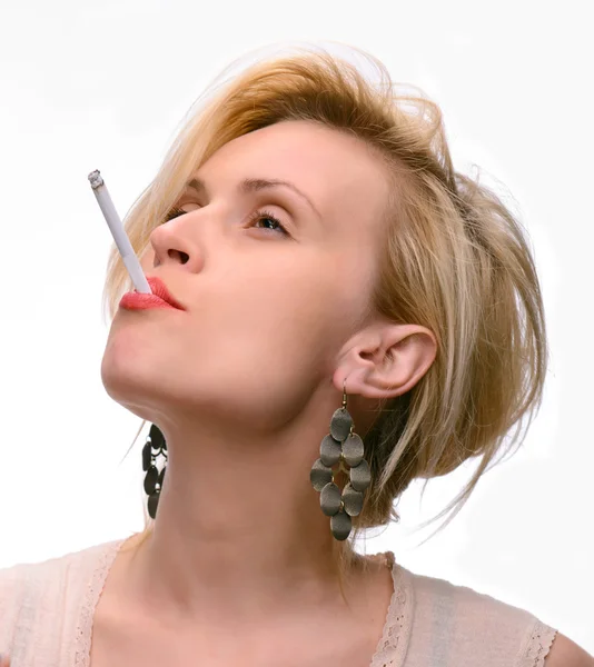 Emotional sexy woman posing with cigarette Stock Photo