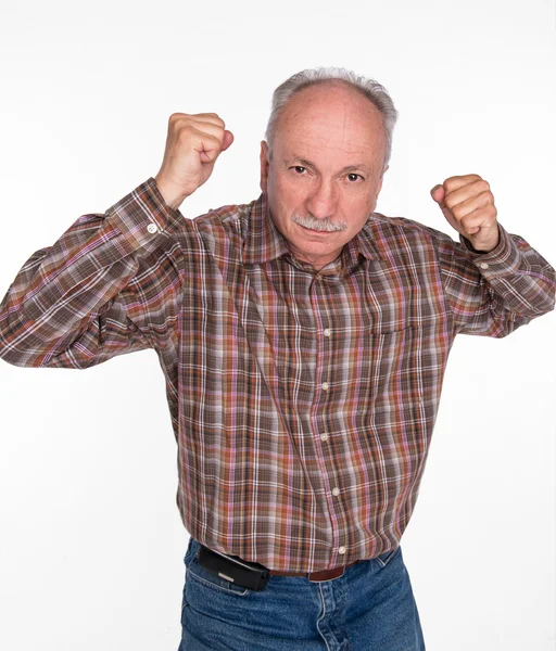 Mature man in boxer pose with raised fists — Stock Photo, Image