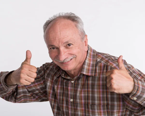 Elderlyl man shows ok sigh — Stock Photo, Image