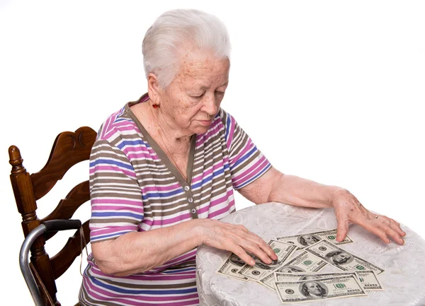 Stara kobieta liczenie pieniędzy — Zdjęcie stockowe
