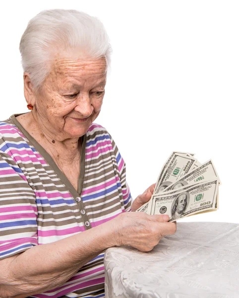 Old woman holding money — Stock Photo, Image