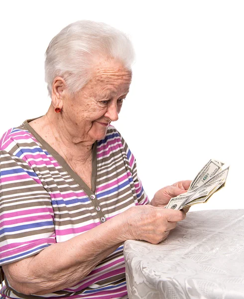 Oude vrouw bedrijf geld — Stockfoto