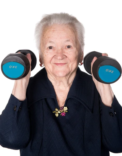 Glad gammal kvinna att göra konditionsträning med hantlar — Stockfoto