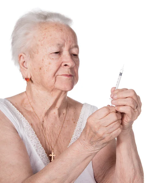 Old woman preparing syringe for making insulin injection — Stock Photo, Image