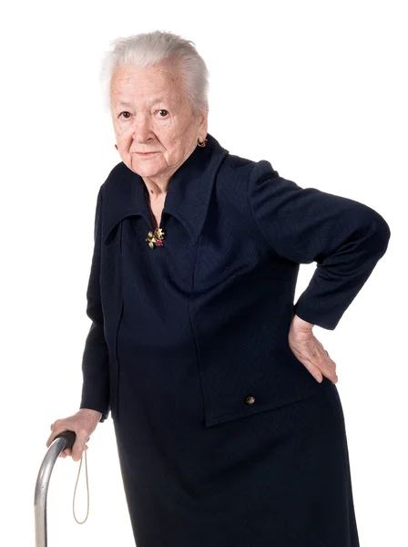 Old woman holding her lower back — Stock Photo, Image