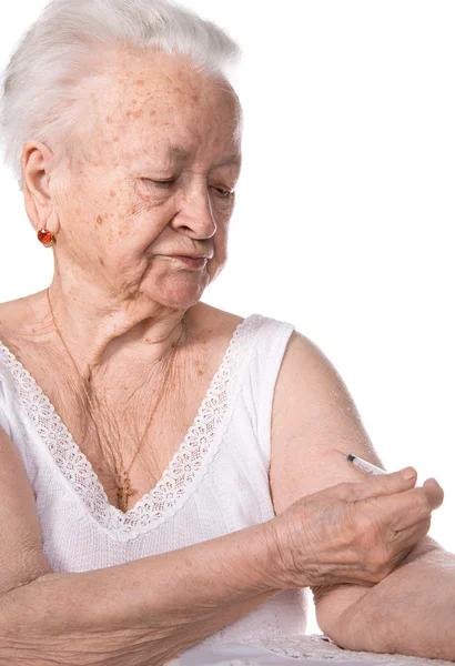 Stara kobieta, oddając się wstrzyknięcie insuliny — Zdjęcie stockowe