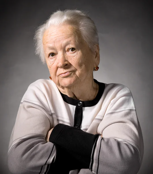 Old thoughtful woman — Stock Photo, Image