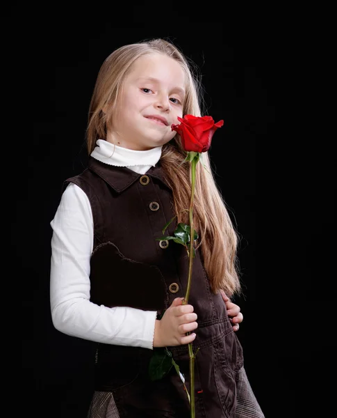 Menina loira bonita com ros — Fotografia de Stock