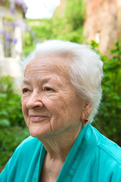 Smiling old woman — Stock Photo, Image