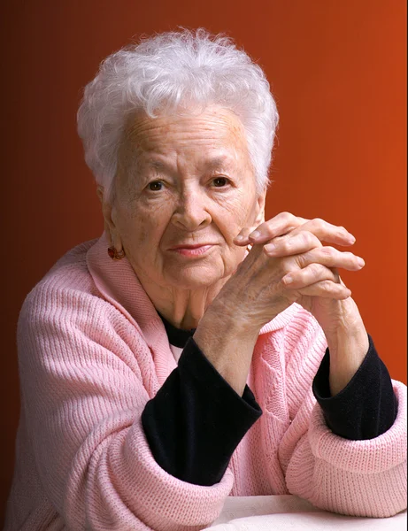 Old thoughtful woman — Stock Photo, Image