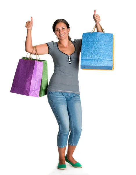 Mulher feliz com sacos de compras — Fotografia de Stock