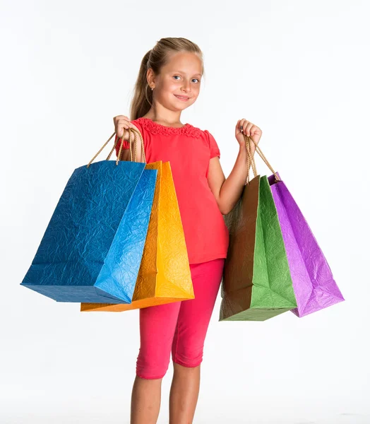 Hübsches Mädchen mit Einkaufstaschen — Stockfoto