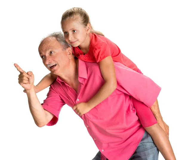 Portrait of a little girl enjoying piggyback ride with her grand — Stock Photo, Image