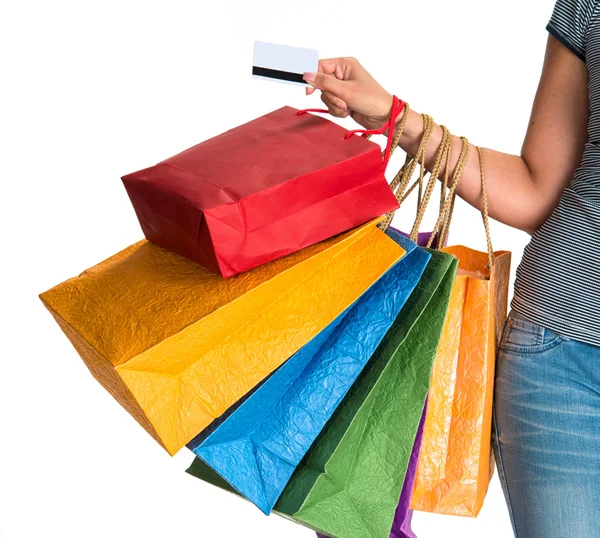 Mano de mujer sosteniendo bolsas de compras —  Fotos de Stock