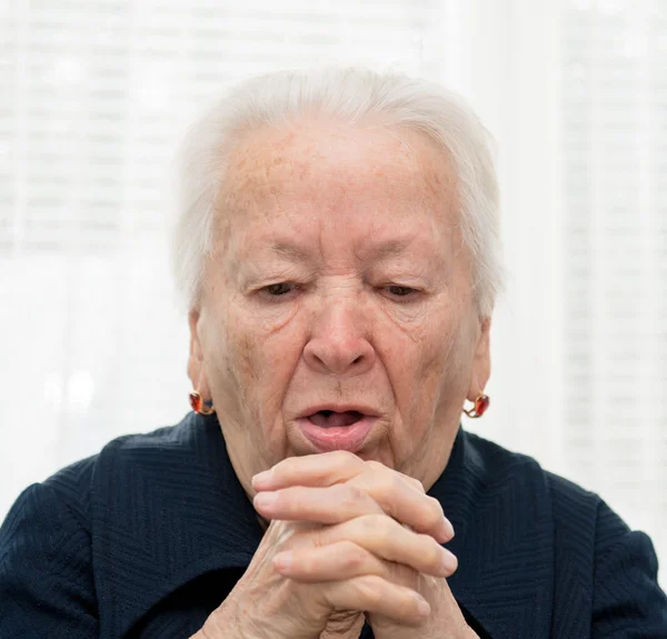 Elderly woman coughing — Stock Photo, Image