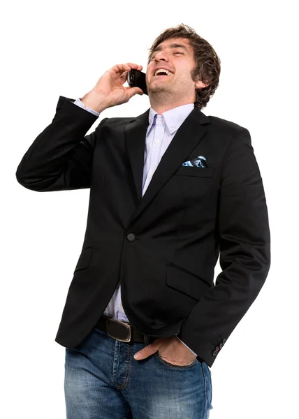 Krásný usměvavý muž s mobilní telefon — Stock fotografie