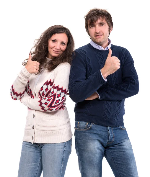 Smiling man and woman showing thumbs up sign — Stock Photo, Image