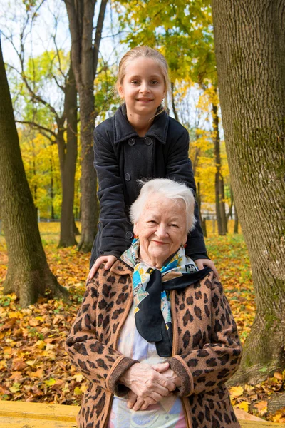 Granddaughter and her grandmother — Stock Photo, Image