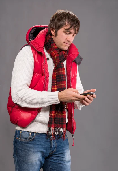 Handsome man sending a text message — Stock Photo, Image