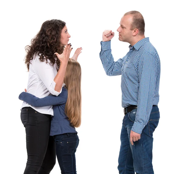 Sad looking girl with her fighting parents — Stock Photo, Image