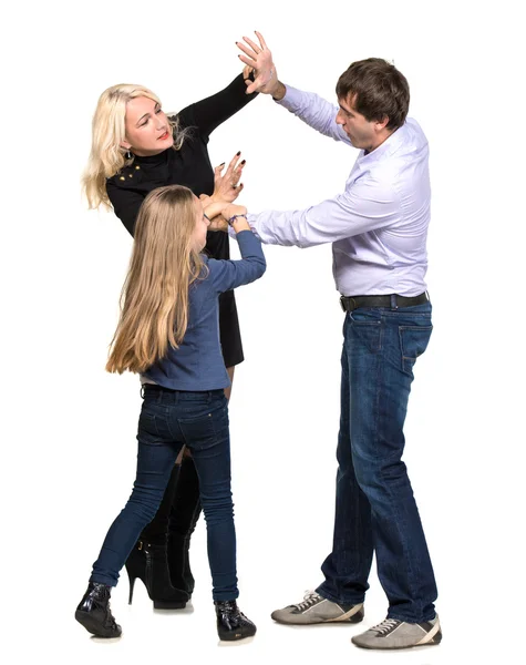 Triest uitziende meisje met haar vechten ouders — Stockfoto