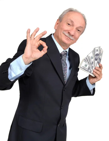 Hombre sosteniendo dólares —  Fotos de Stock