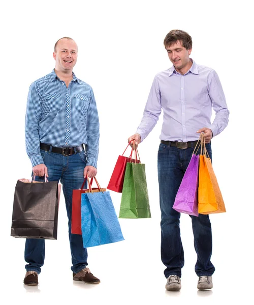 Iki erkekle birlikte alışveriş torbaları — Stok fotoğraf