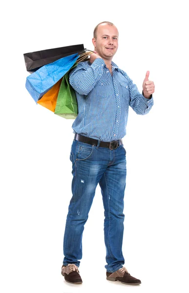 Schöner Mann mit Einkaufstaschen — Stockfoto