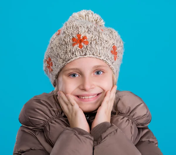 Cute scholgirl in warm clothes — Stock Photo, Image