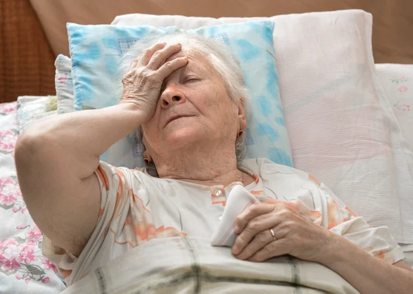 Stará nemocná žena — Stock fotografie
