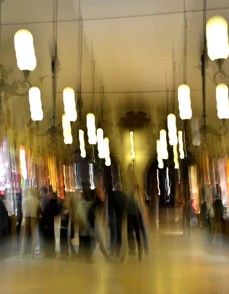 People silhouettes in shopping mall — Stock Photo, Image